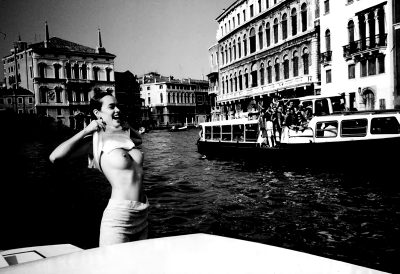 Girl Flashing On The Grand Canal – Venice, Italy – 1986 – Ph. Helmut Newton