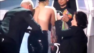 Lady Gaga Strips On Stage